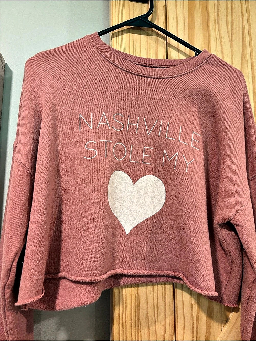 Kittenish Nashville Graphic Cropped Sweatshirt in Pink